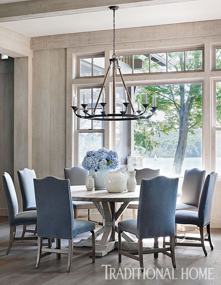 Enhance your kitchen with some round
  dining room tables