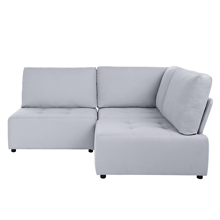 Buy a small corner sofa to get a bigger
look of the room
