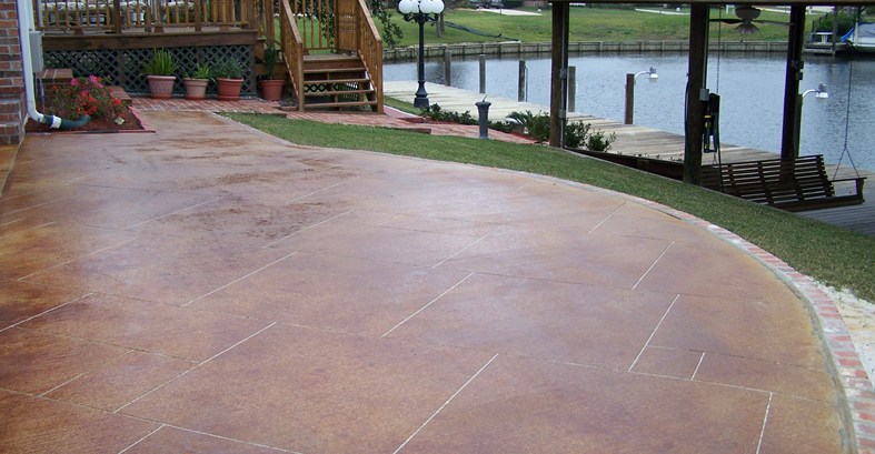 stained concrete patio red stain, sawcut grout lines concrete patios artistic concrete floors llc  madisonville, ESQZNYF