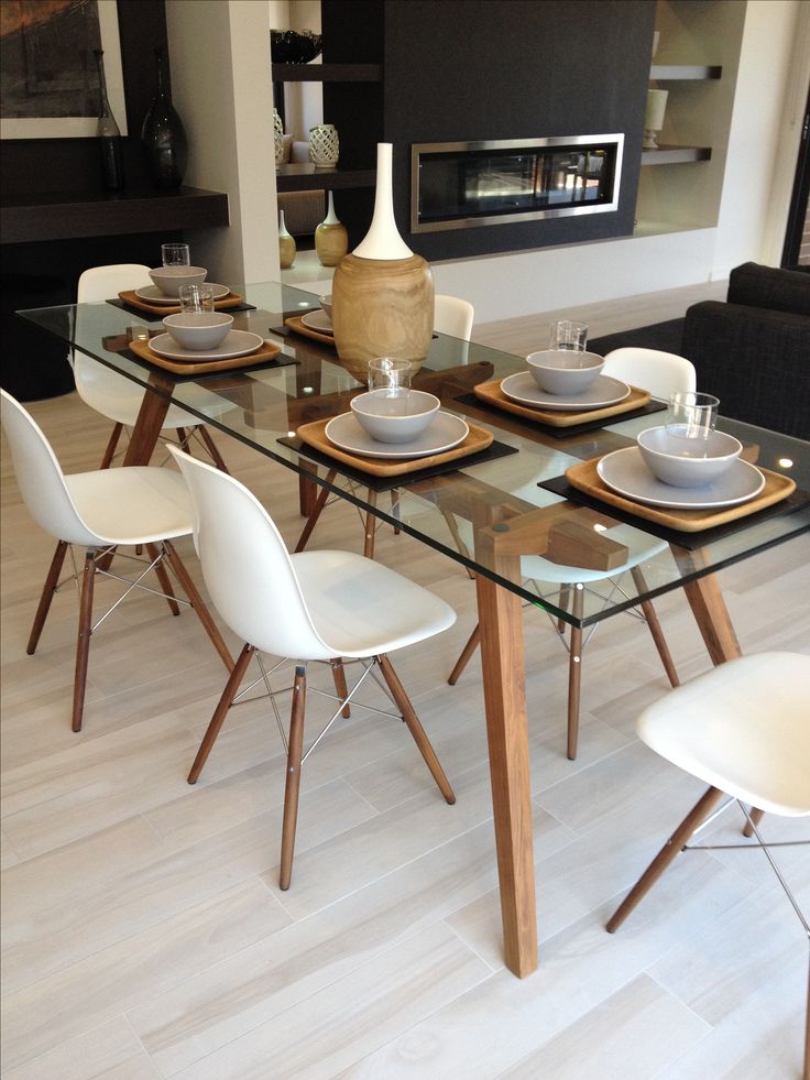 sticotti glass dining table and eames dining chairs in walnut JUGRSFE