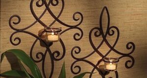wrought iron wall decor this pair of iron wall sconces can be displayed at graduated heights or TFHWWTC