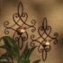 wrought iron wall decor this pair of iron wall sconces can be displayed at graduated heights or TFHWWTC