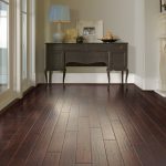 budget friendly flooring dark laminate or vinyl flooring that looks like wood HERRNWO