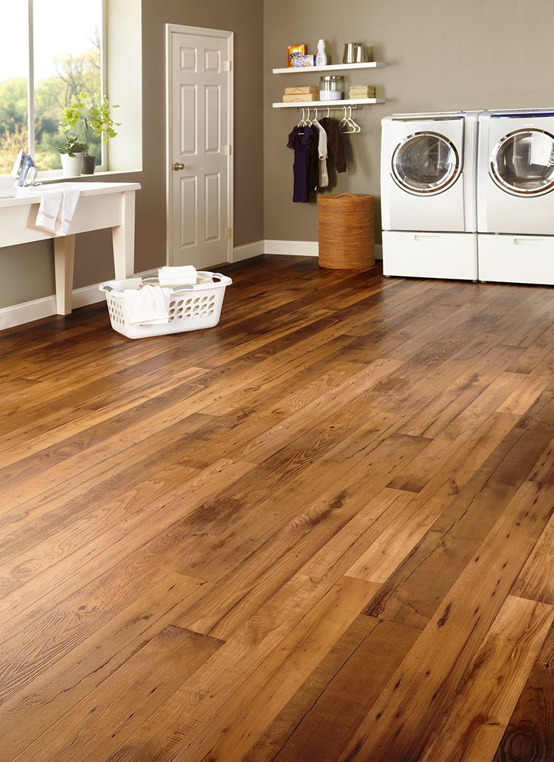 budget friendly flooring for your laundry room | warm oak vinyl flooring | ADIBVRG