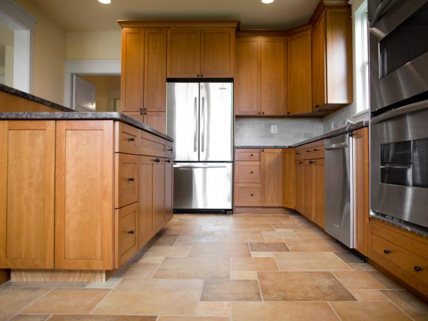 kitchen flooring materials spacious kitchen with wood and tile EFHNAMG