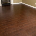 laminate hardwood choosing between hardwood and laminate wood flooring JKWAAPG