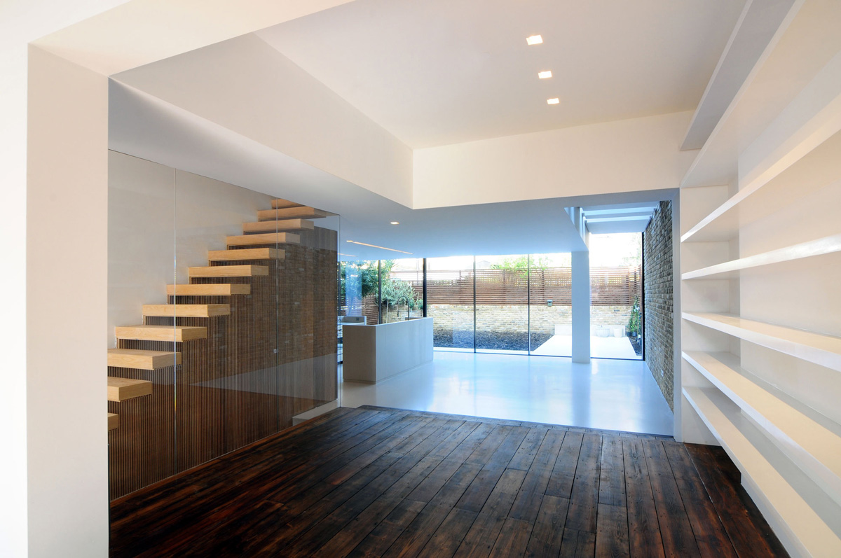 modern dark wood floors dark wood flooring, stairs, glass wall, modern home in london by bureau de VJHMRGL