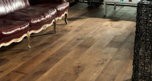 oak old venice wide plank flooring rustic-living-room TJTLOQF