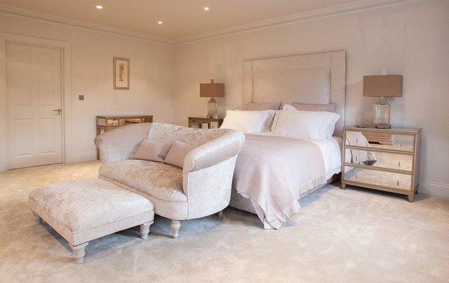 sofas for bedroom inspiration for a transitional master carpeted bedroom remodel in surrey  with beige VRGDKKE