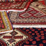 stock photo - textures and background of ancient handmade carpets and rugs SAONQPL