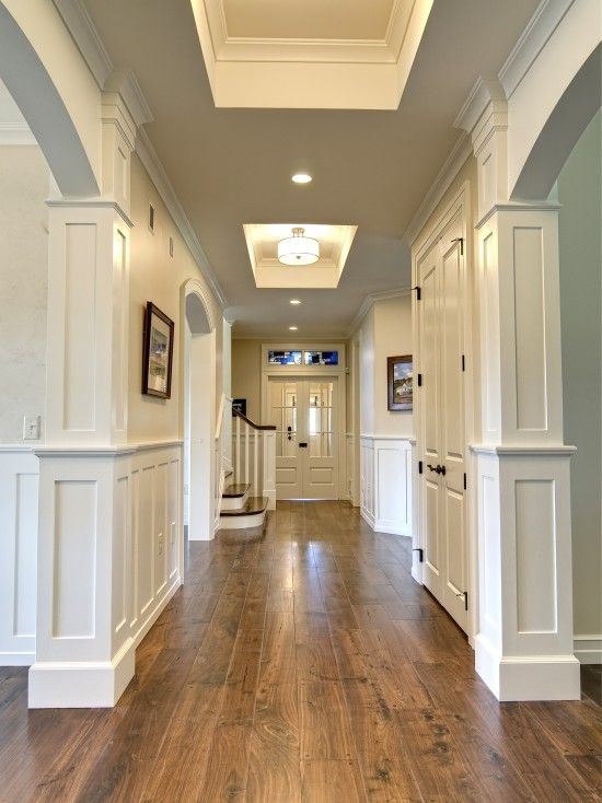 wood flooring ideas walnut hardwood floors against white walls and doors - beautiful DRRISGM