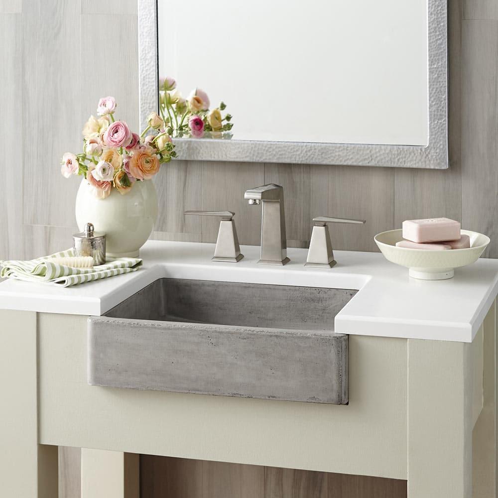 Install a farmhouse sink for functionality in farmhouse bathrooms