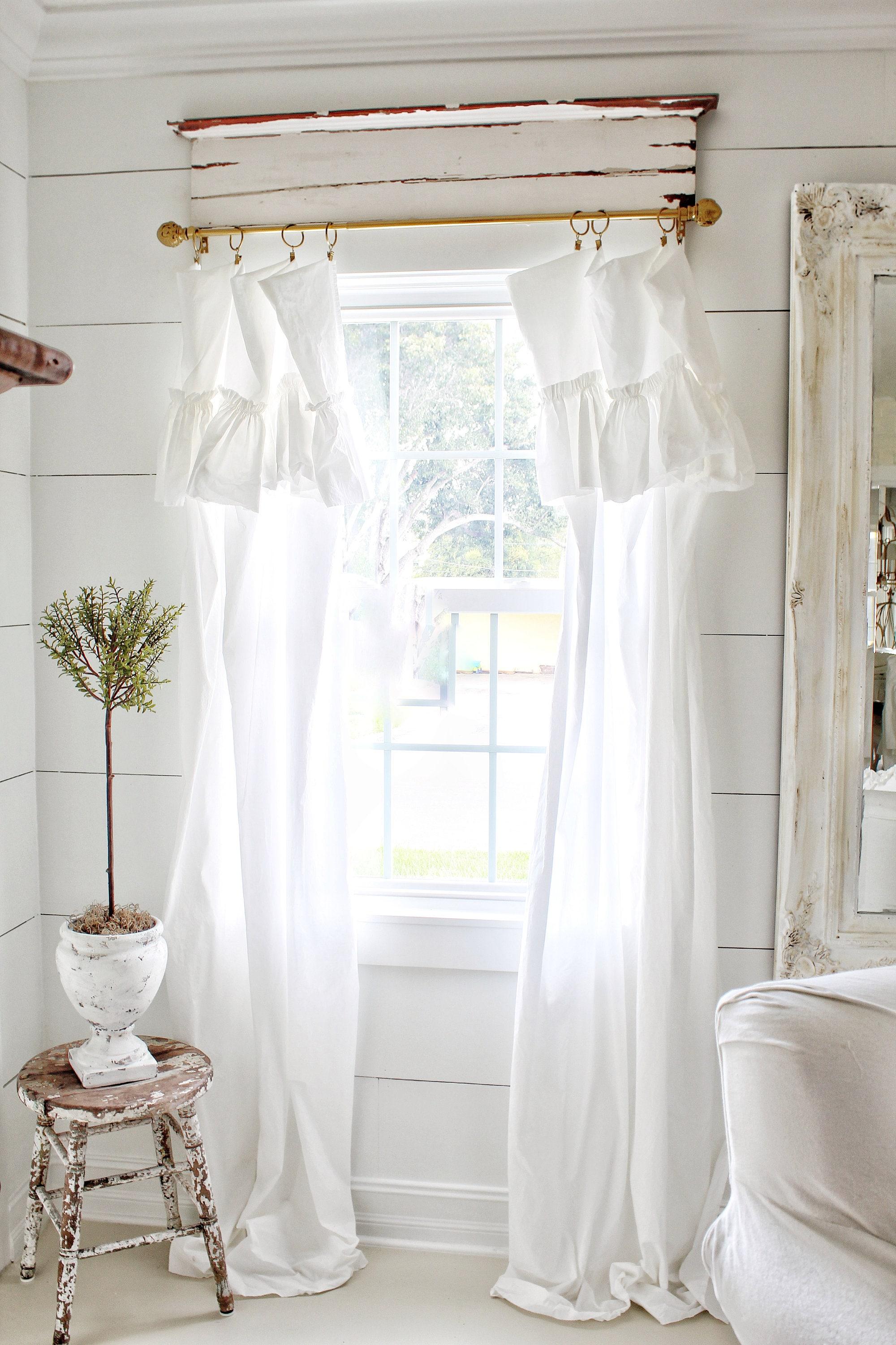 Hang⁤ farmhouse-style curtains for added privacy and style