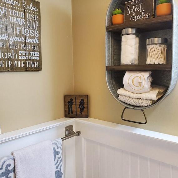 Open shelving offers functionality in charming farmhouse bathrooms