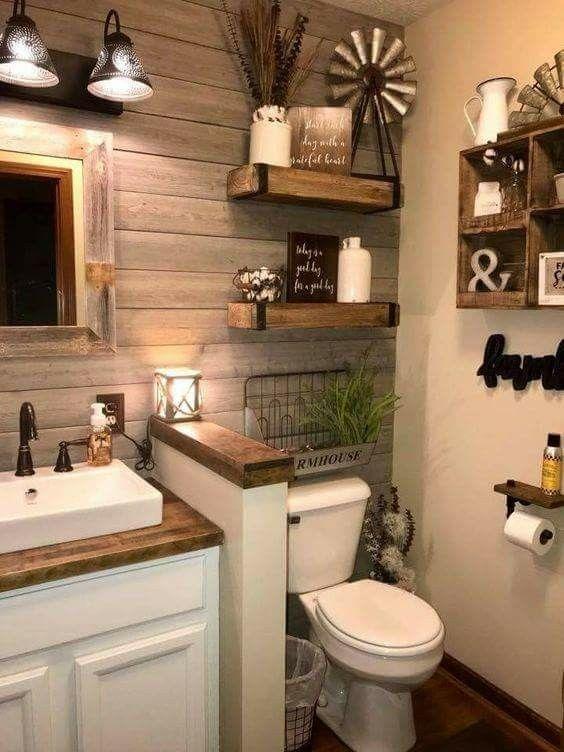 Choose rustic wood accents to warm up farmhouse bathrooms