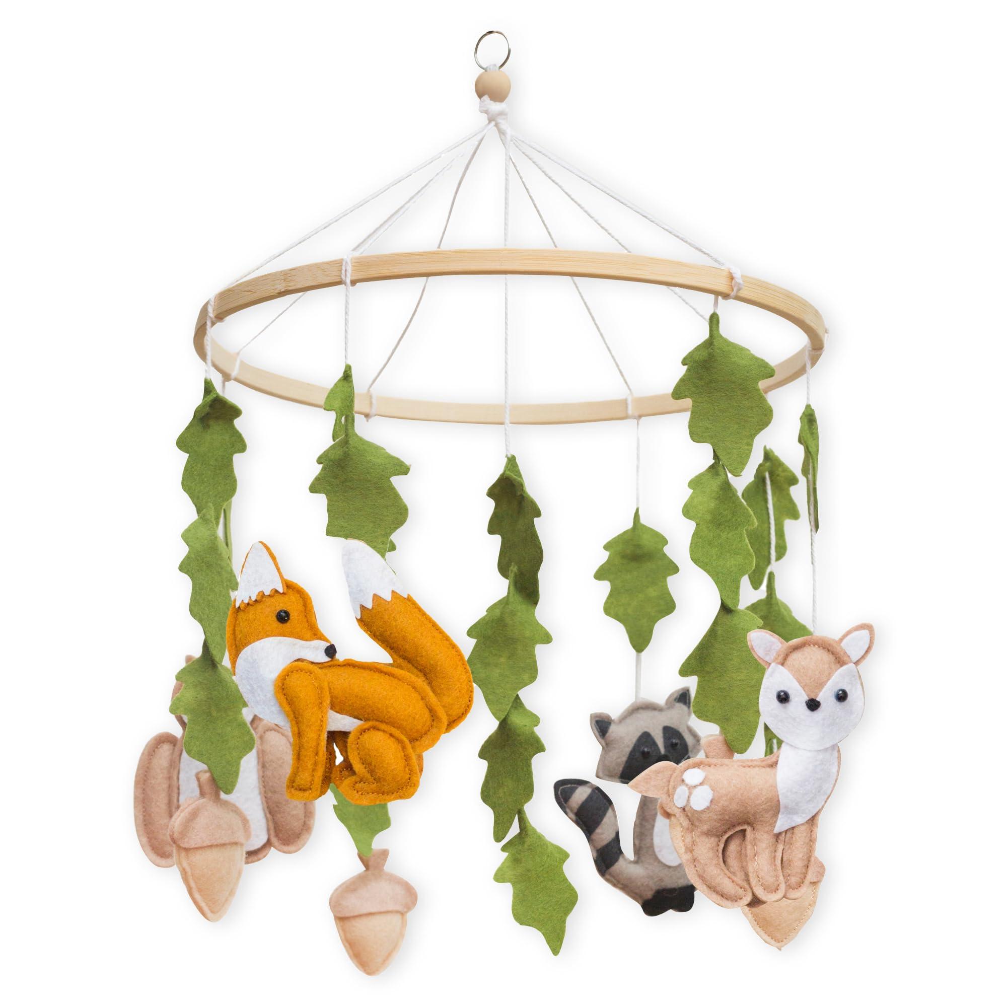 Hang a‌ mobile featuring whimsical ‌creatures above ‌the​ crib