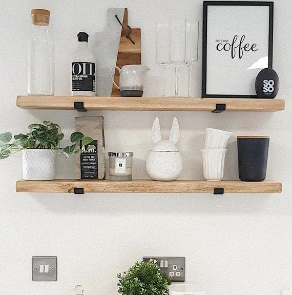 Add open shelving to display essentials in farmhouse bathrooms