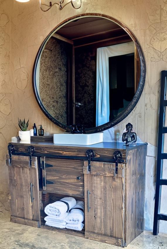 Barn doors serve ⁤as stylish ​entries in ⁢farmhouse bathrooms