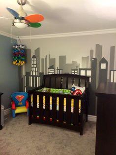 Design a superhero-themed boy ​nursery for a touch of adventure