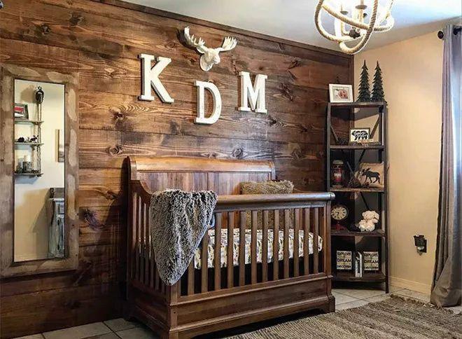 Rustic wooden elements give warmth and charm to any boy nursery