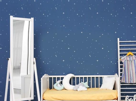 Adorn the walls with starlit skies for a dreamy boy‍ nursery retreat