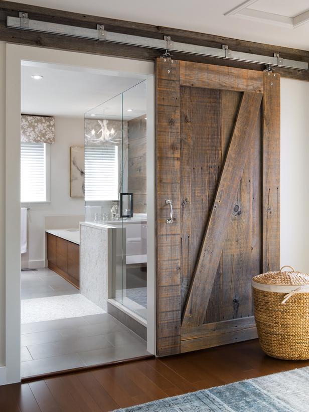 Incorporate a sliding barn door for farmhouse bathrooms privacy