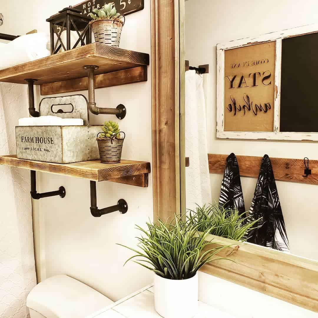 Add potted plants for a refreshing vibe in farmhouse bathrooms