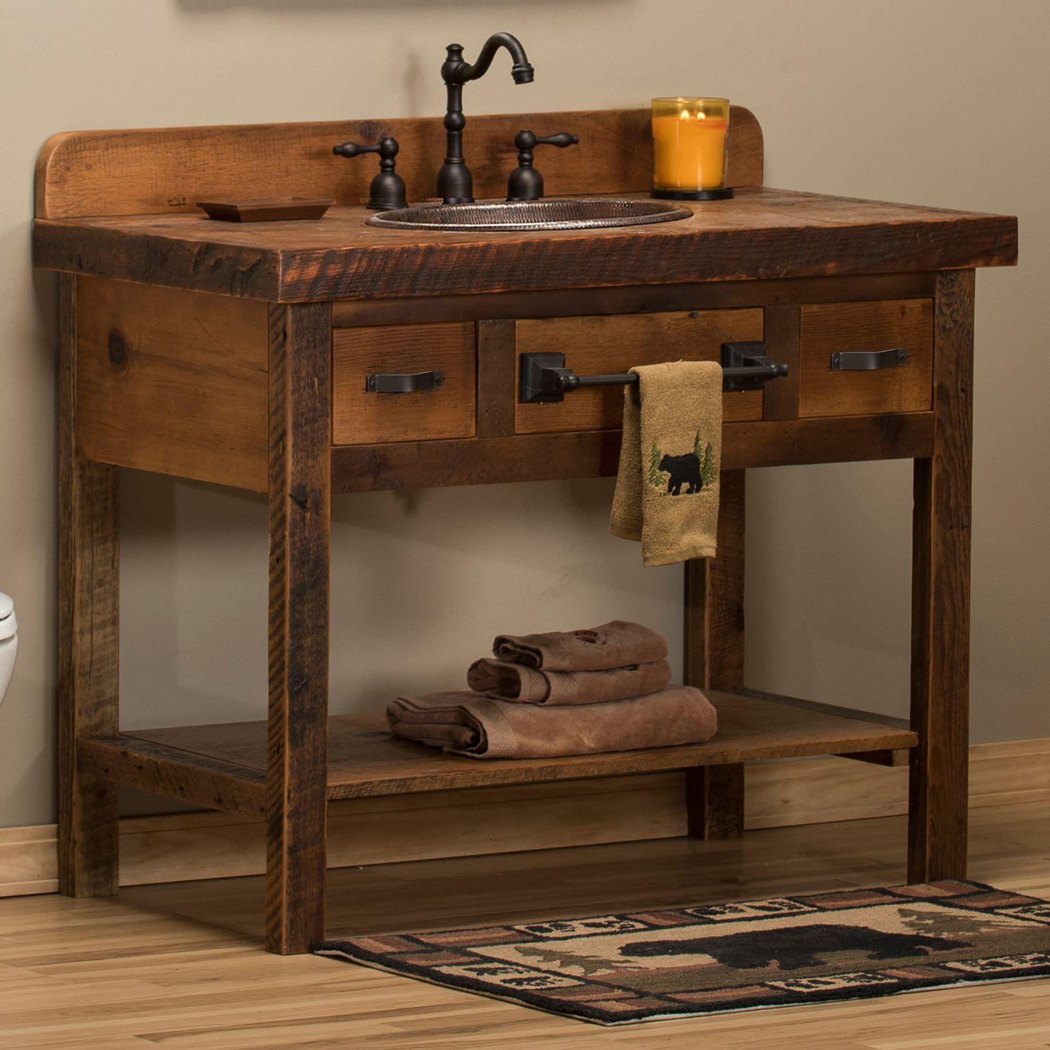 Create a rustic sink with reclaimed barn wood for farmhouse bathrooms