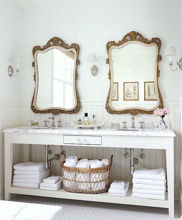 Antique mirrors add elegance ‍to farmhouse bathrooms