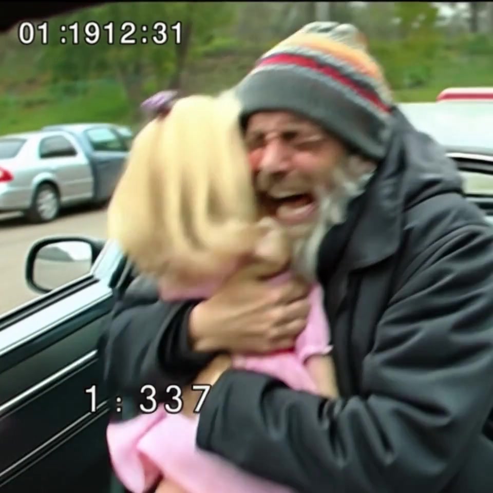 A homeless man was rummaging through a garbage container when he suddenly noticed an old