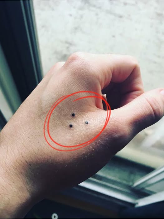 The Hidden Meaning Behind the Three-Dot Tattoo