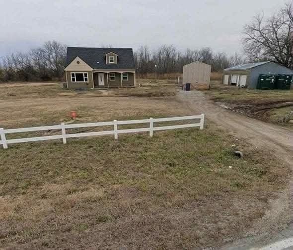 Spacious 4.2-Acre Property Near Augusta, Kansas with Renovation Potential