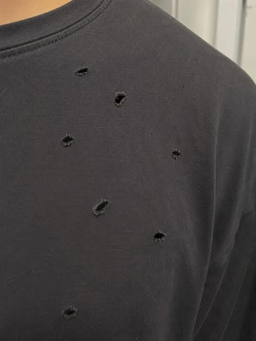 Finding Mysterious Holes in Your T-Shirts? The Cause May Be Simpler Than You Think