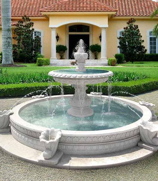 Feature a stunning water fountain⁢ as a focal point in your front yard landscaping