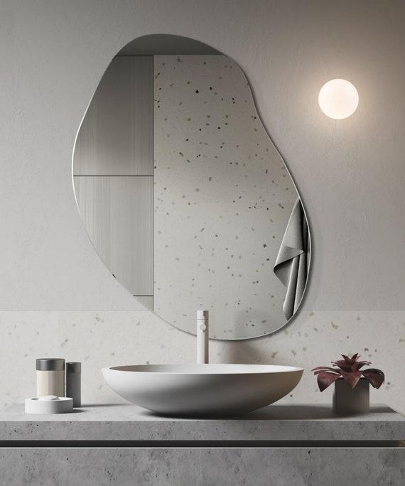 Statement bathroom mirrors: Create ​focal points with unique shapes and sizes