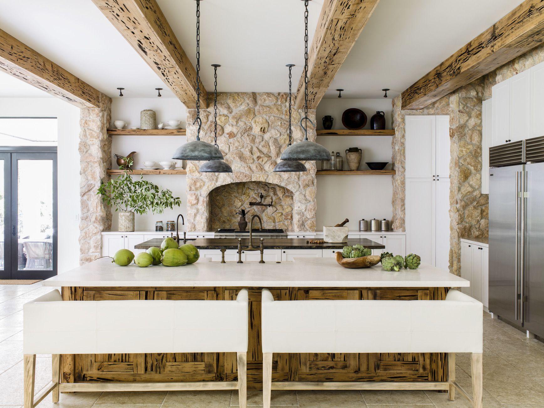 A large ​kitchen island, ​ideal for meal prep and casual gatherings in your farmhouse kitchen