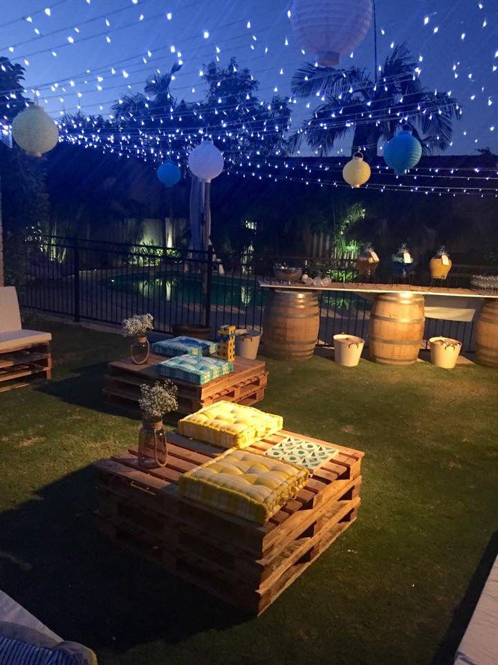 Pair your pallet garden with fairy lights for a magical evening atmosphere