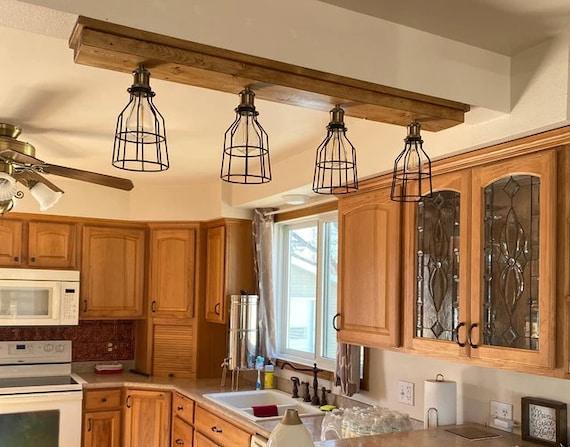 Farmhouse-style lighting fixtures that illuminate your kitchen with warmth and personality