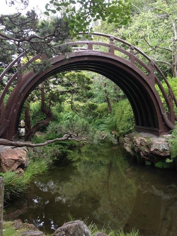 Traditional Zen bridges ​invite exploration and wonder in your‌ gardens landscape