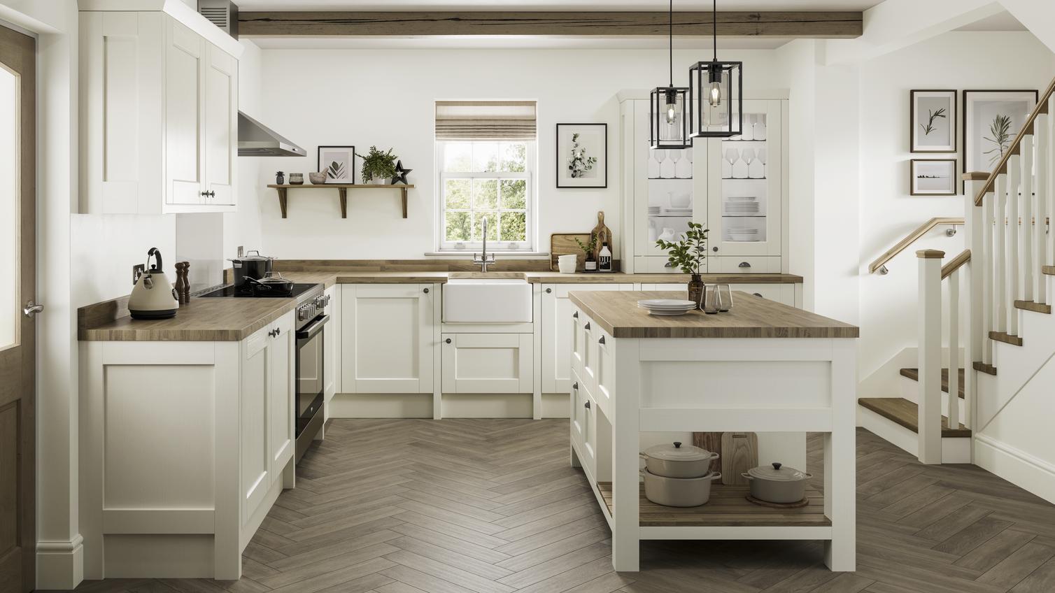 Classic white cabinetry, providing a bright and airy feel to the farmhouse kitchen