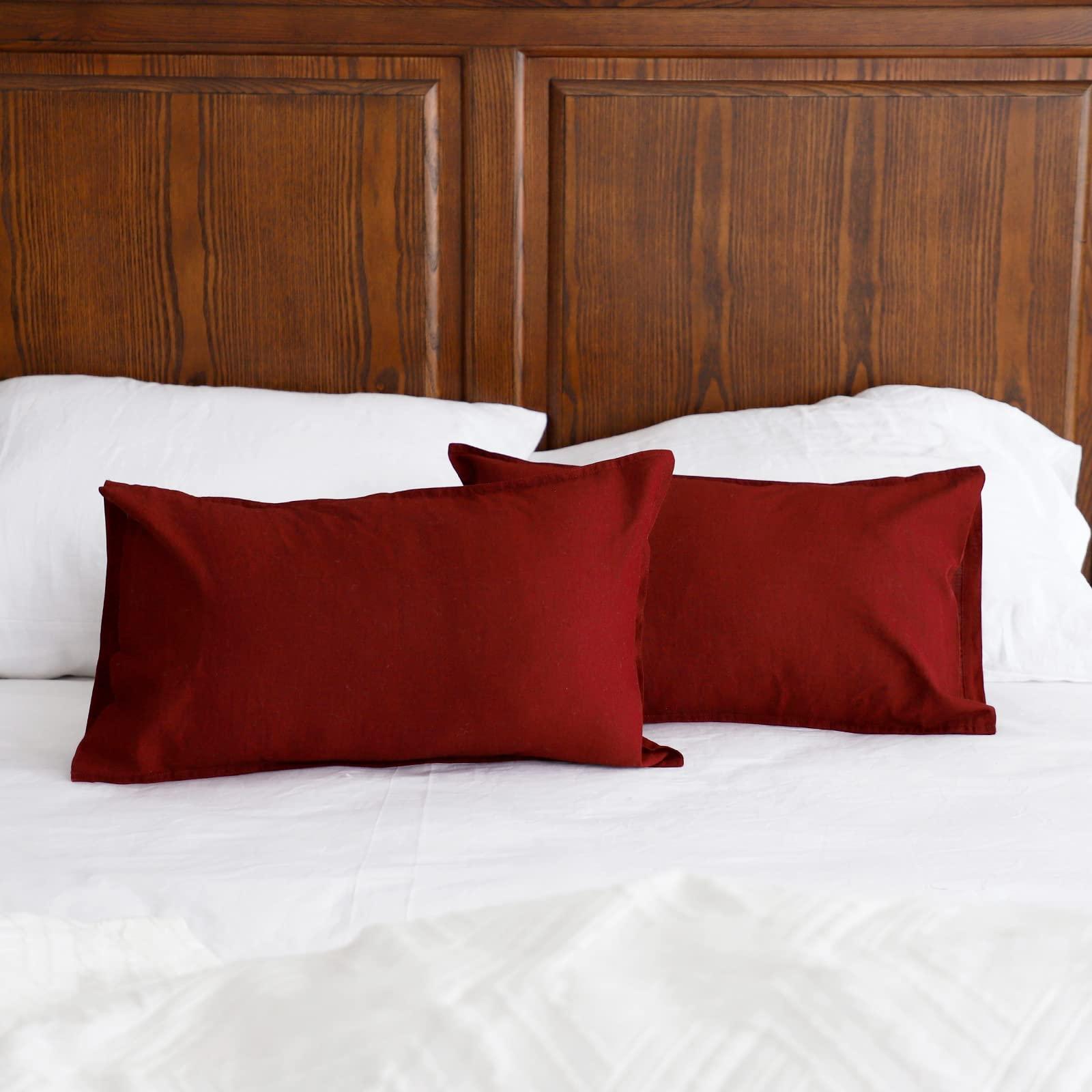 Layer textured pillows to enhance comfort in your Burgundy Bedroom