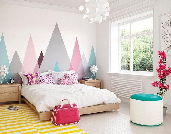 Use a statement wall mural to add personality to your teen girl bedroom