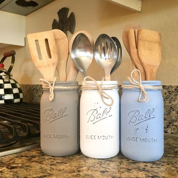 Mason jars‍ are perfect for storage and decor in a farmhouse kitchen