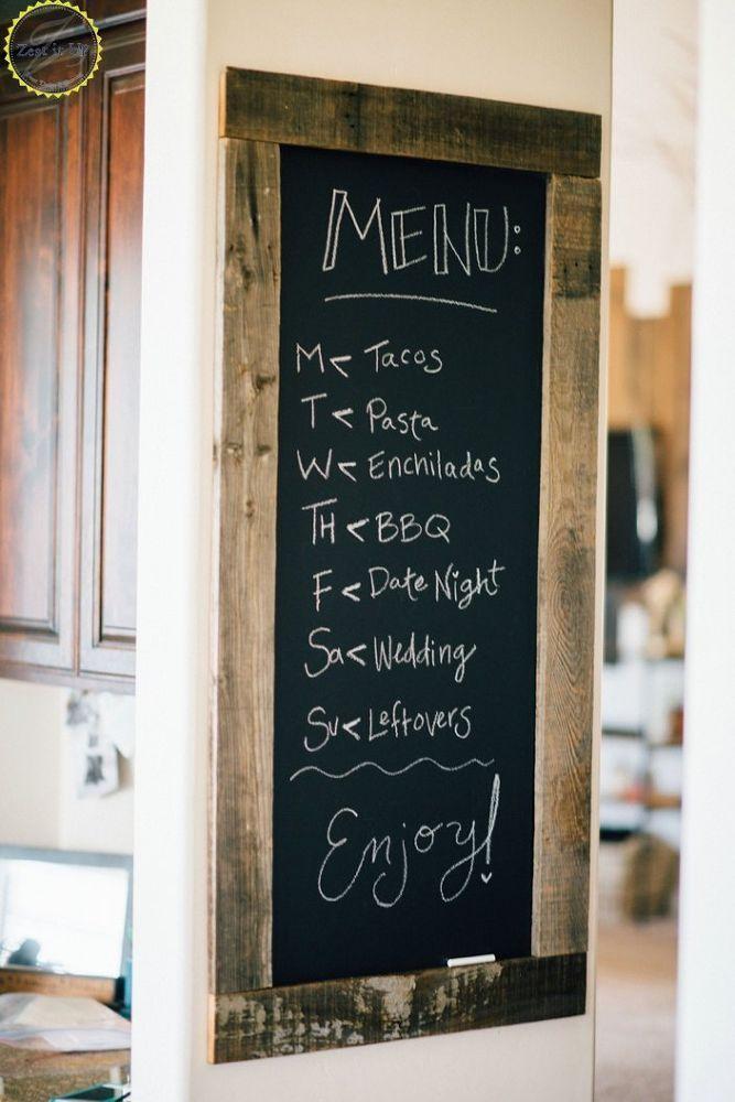 A chalkboard wall ⁢for notes and menus in your farmhouse⁢ kitchen