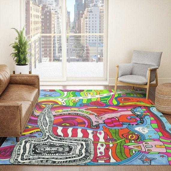 Anchor your eclectic living⁣ room with ⁤a striking area rug that ​ties‌ together colors