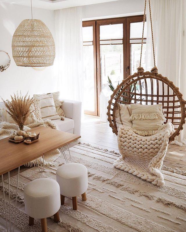 Add‌ a hammock ​chair for a fun twist in your Boho‍ Living Room ‍design