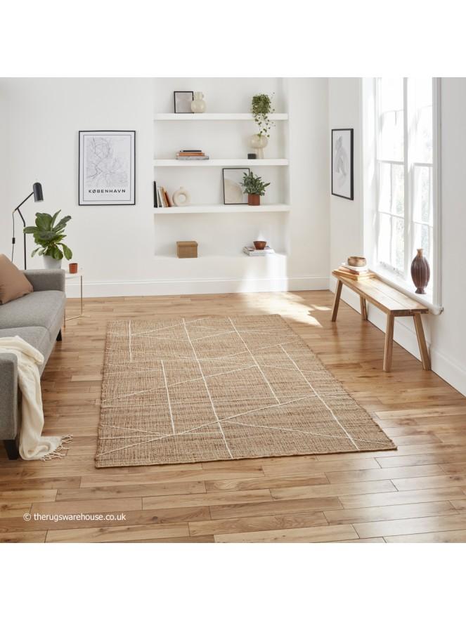 Utilize a jute area rug to ground your ‍earthy ‌living ​room