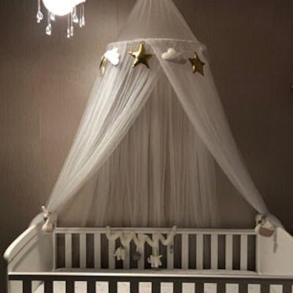 Create a dreamy canopy over the crib in‌ your Nursery Nook