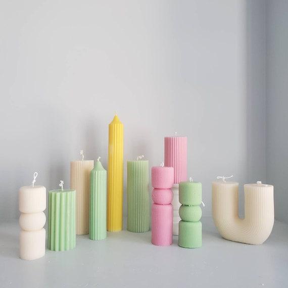 Foster​ tranquility⁣ with gentle ‌scent ⁣through candles in your minimalist bedroom