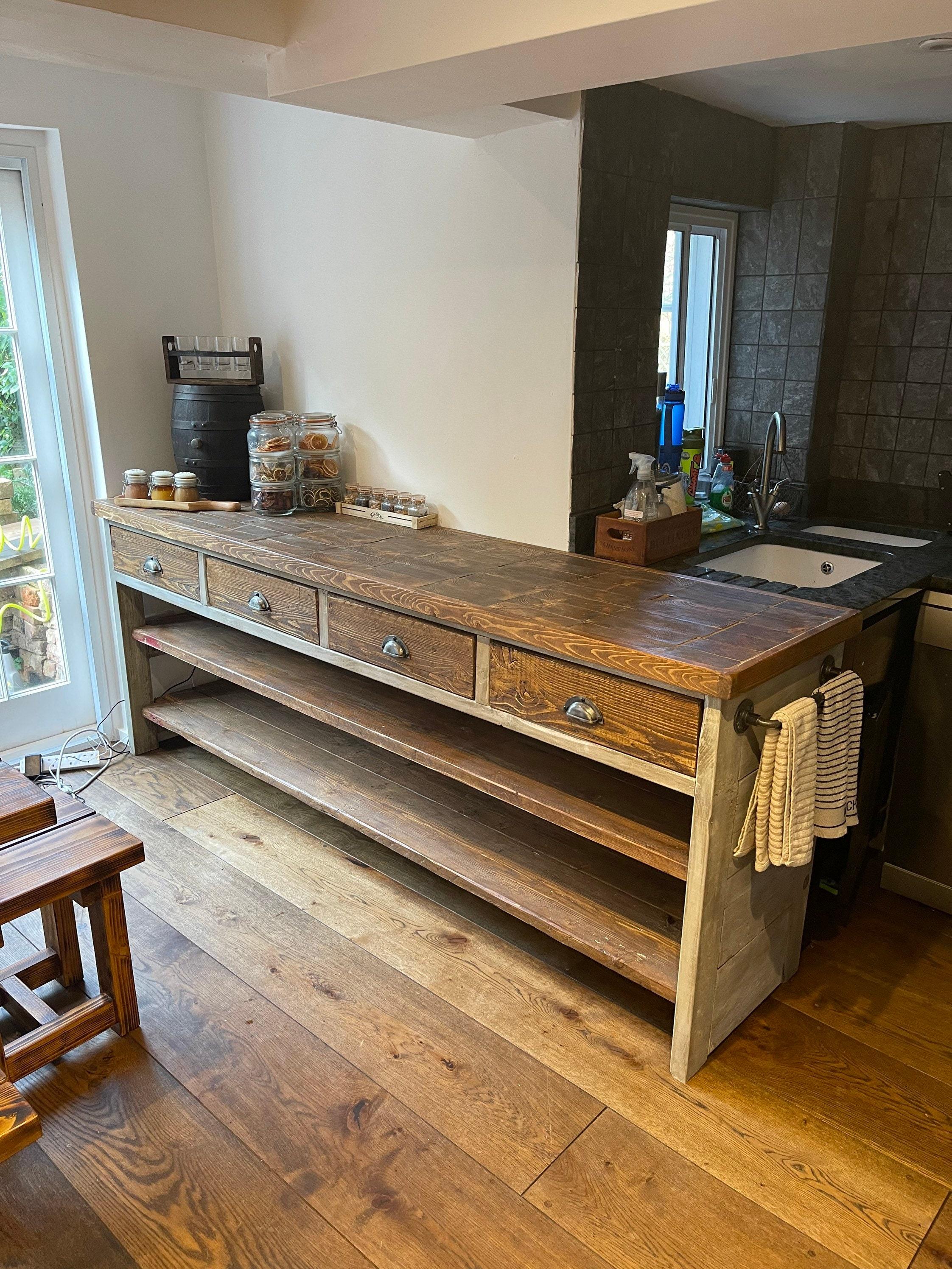 Reclaimed wood accents lend authenticity to your farmhouse kitchen design